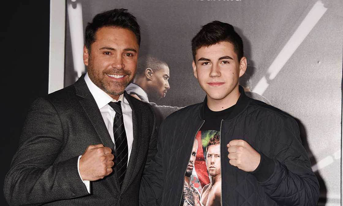Oscar De La Hoya (L) and son Devon De La Hoya (R) arrive at the premiere of Warner Bros. Pictures' 'Creed' at Regency Village Theatre
