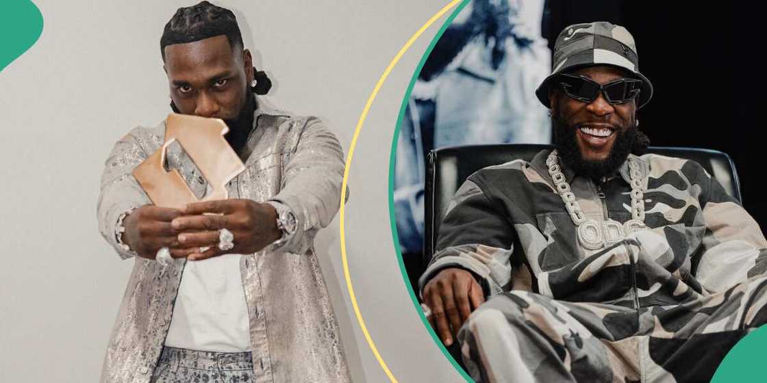 Burna Boy holding his UK No 1 album plaque, Burna Boy Burna Boy holding his UK No 1 album plaque, Burna Boy