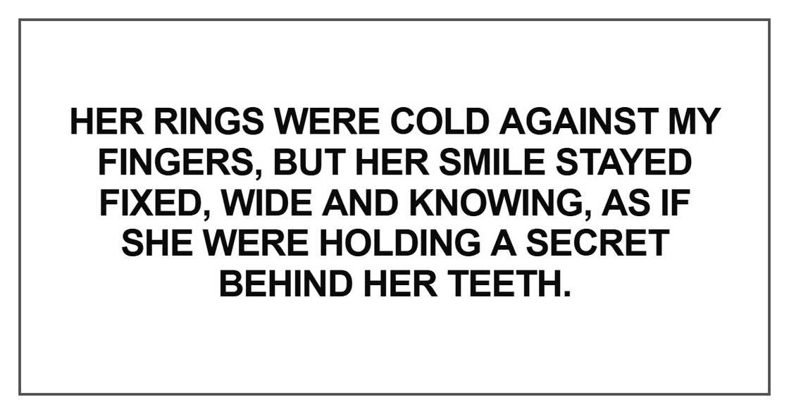 Her rings were cold against my fingers