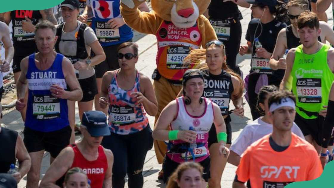 Participants of a race take off at a starting point Participants of a race take off at a starting point