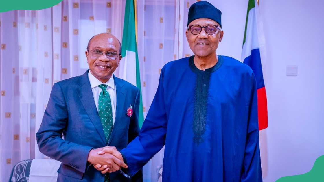 Godwin Emefiele shakes hands with the former president of Nigeria, Muhammadu Buhari Godwin Emefiele shakes hands with the former president of Nigeria, Muhammadu Buhari