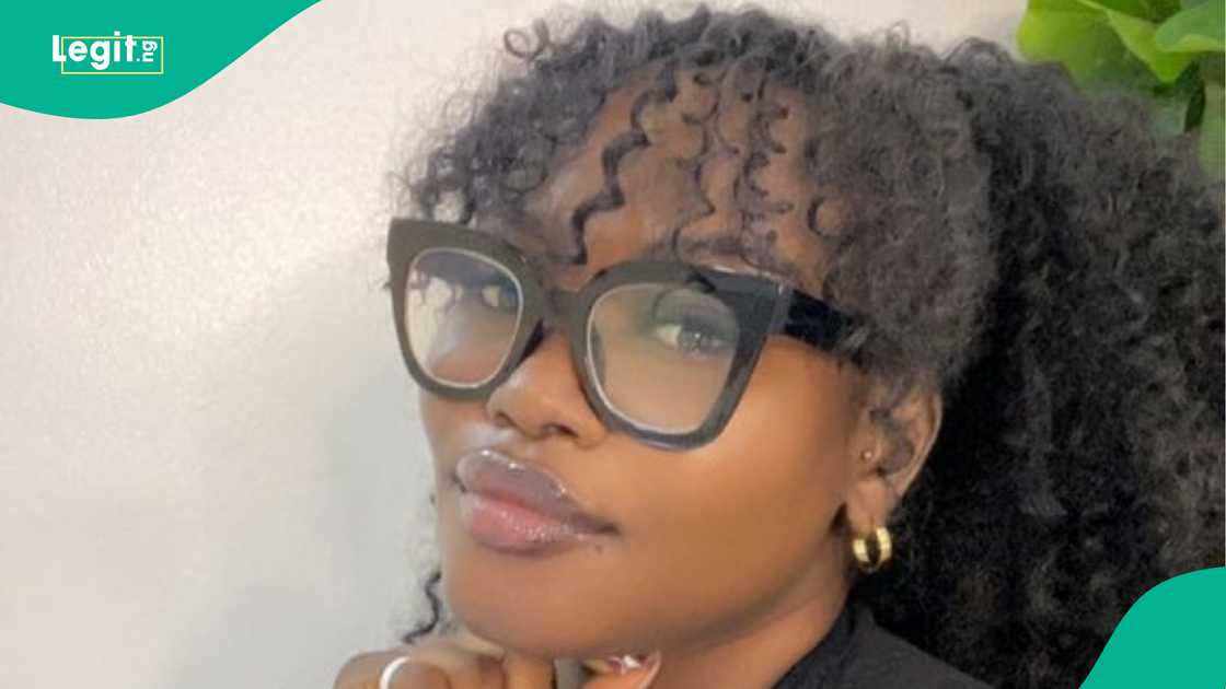 Grieving daughter seen sitting beside her late father's coffin. Grieving daughter seen sitting beside her late father's coffin.