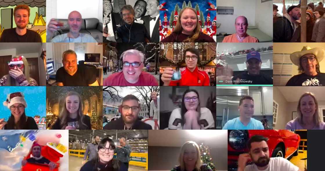 Participants in a Zoom call are pictured laughing and wearing themed costumes. Participants in a Zoom call are pictured laughing and wearing themed costumes.