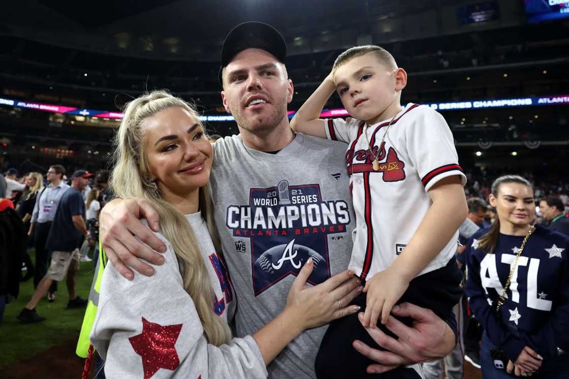 Freddie Freeman celebrates with wife Chelsea Freeman and son at Minute Maid Park Freddie Freeman celebrates with wife Chelsea Freeman and son at Minute Maid Park