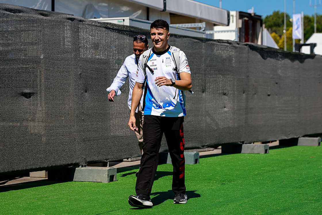 Isack Hadjar walks in the paddock at Circuit de Barcelona-Catalunya Isack Hadjar walks in the paddock at Circuit de Barcelona-Catalunya