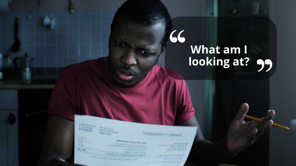 A shocked man reading a document