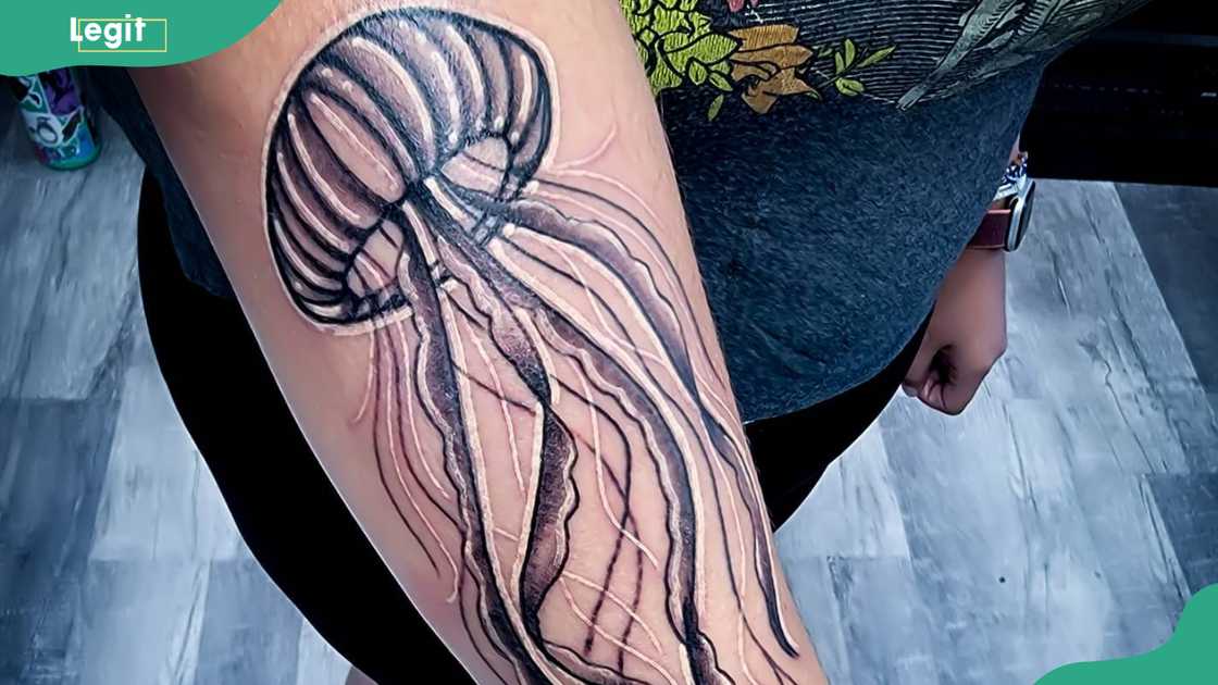 Tribal jellyfish tattoo Tribal jellyfish tattoo
