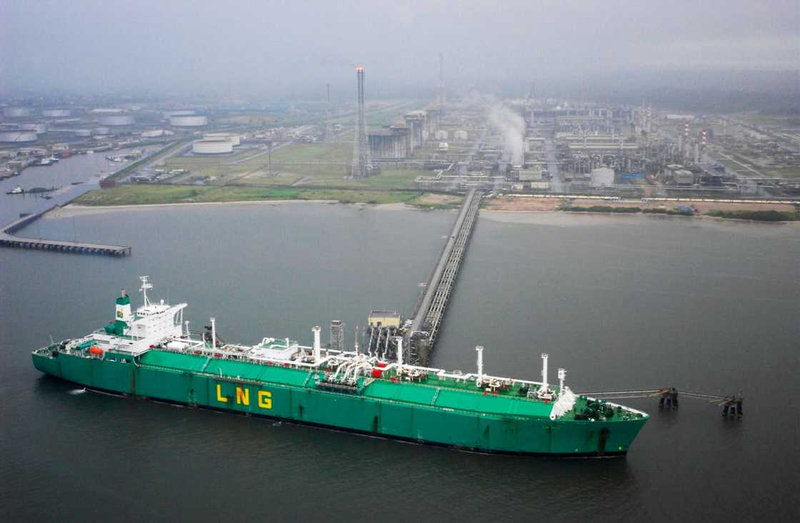 A ship loads liquefied natural gas from the Nigerian Liquefied Natural Gas plant on Bonny Island, Nigeria A ship loads liquefied natural gas from the Nigerian Liquefied Natural Gas plant on Bonny Island, Nigeria