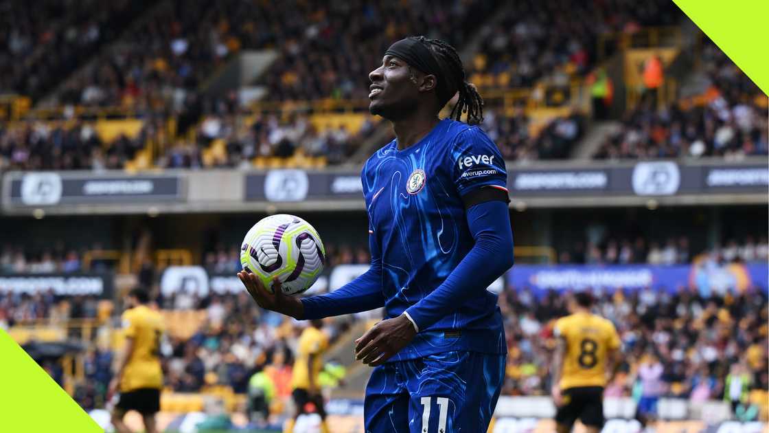 Noni Madueke with the matchball after scoring a hat-trick for Chelsea against Wolves.