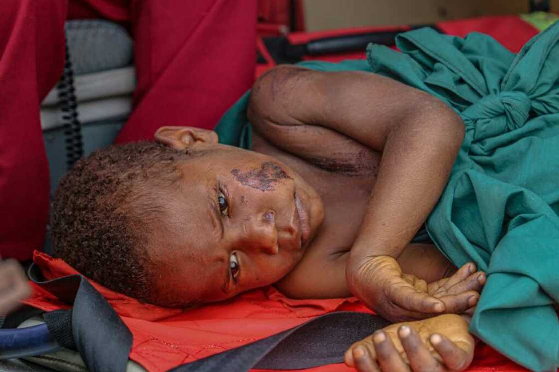 A six-year-old boy is evacuated by helicopter after being injured in a landslide caused by a massive 7.6 magnitude earthquake, which struck a rural area of Papua New Guinea on Sunday