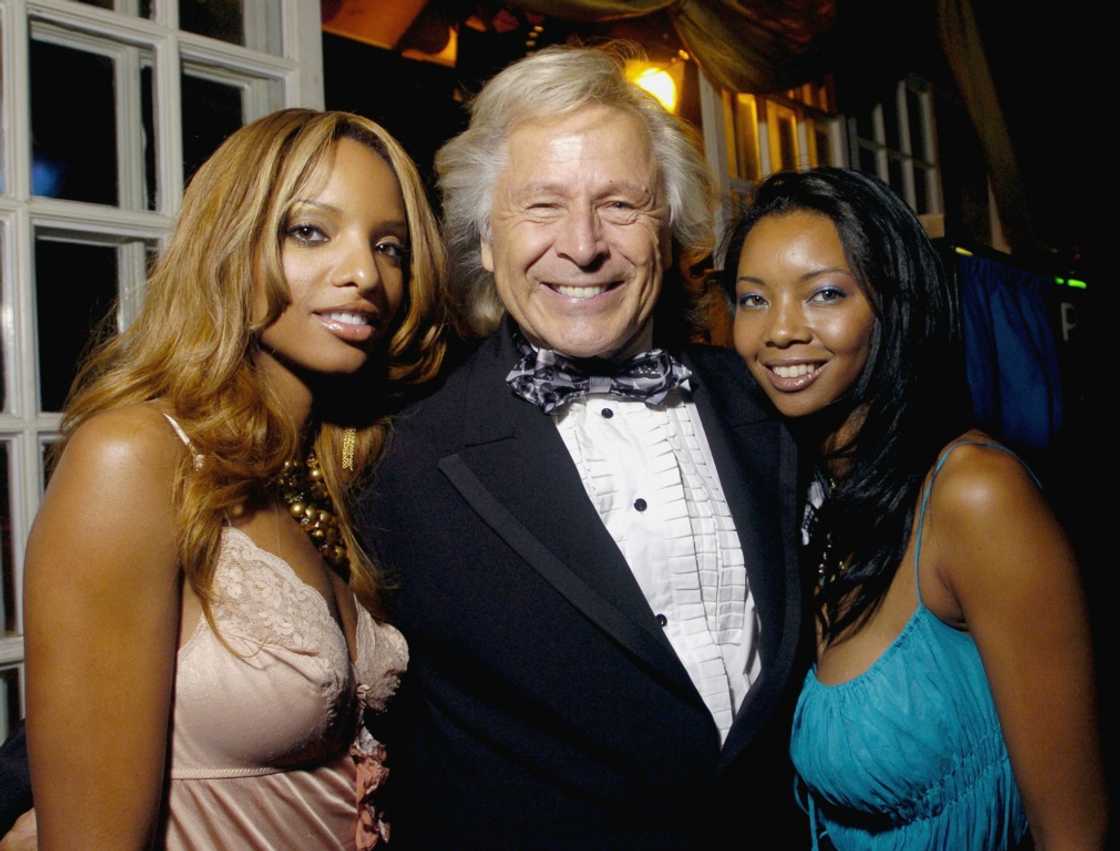 Peter Nygard, here during his jet-setting days, with two women at the opening party of the Toronto International Film Festival in September 2005