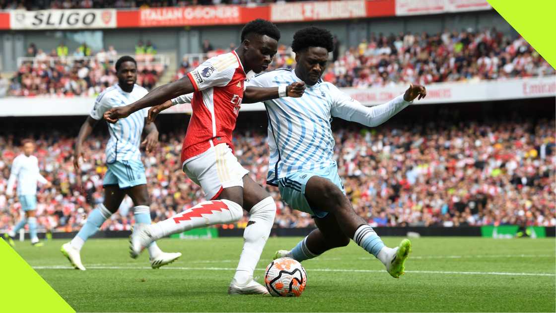 Bukayo Saka, Ola Aina, Arsenal, Nottingham Forest, Emirates Stadium, London, England, Premier League. Bukayo Saka, Ola Aina, Arsenal, Nottingham Forest, Emirates Stadium, London, England, Premier League.