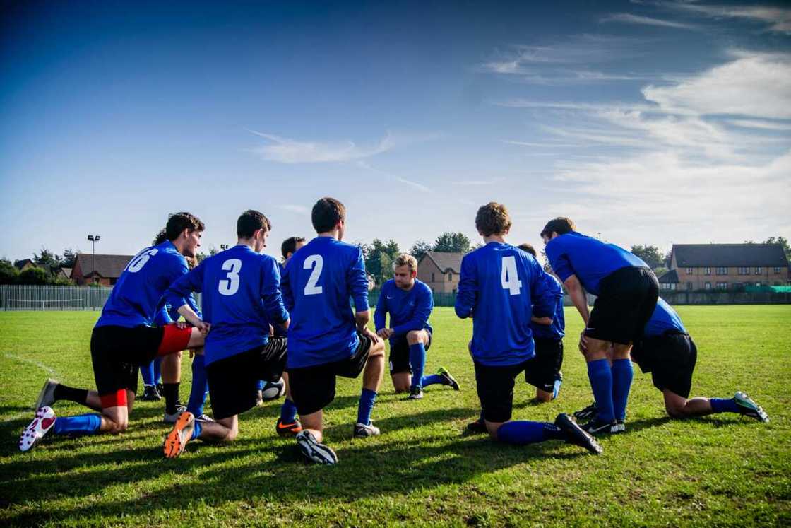 A group of players in the field