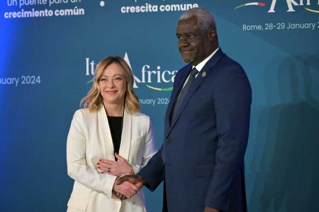Italy's Prime Minister, Giorgia Meloni welcomes Chairperson of the African Union Commission Moussa Faki Mahamat as he arrives for the Italy-Africa international conference 'A bridge for common growth’ at the Italian Senate in Rome on January 29, 2024. Italy's Prime Minister, Giorgia Meloni welcomes Chairperson of the African Union Commission Moussa Faki Mahamat as he arrives for the Italy-Africa international conference 'A bridge for common growth’ at the Italian Senate in Rome on January 29, 2024.