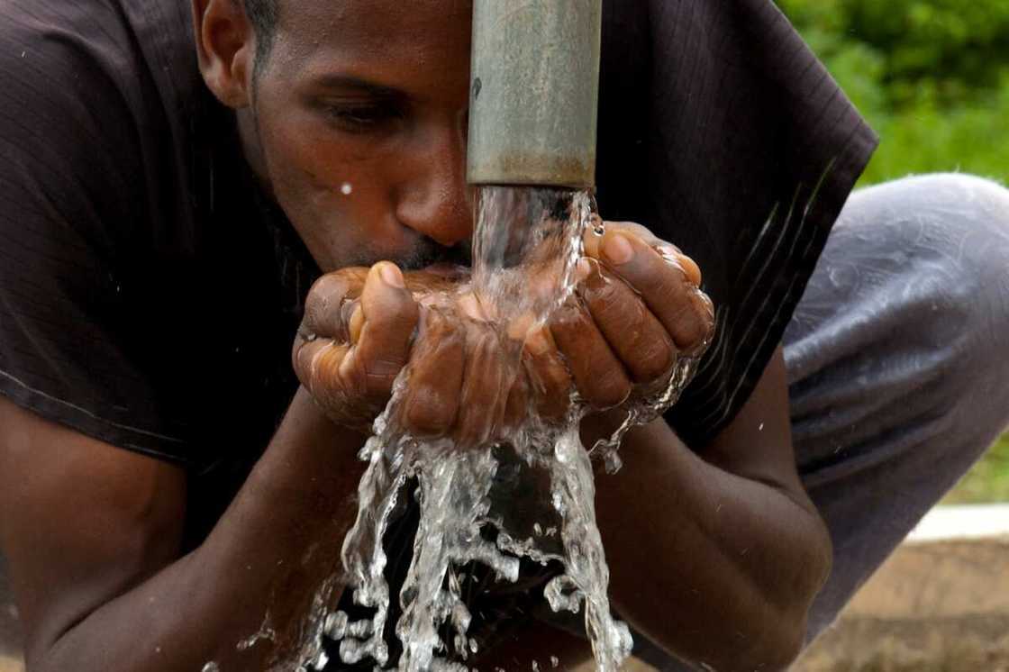 man drinks water man drinks water