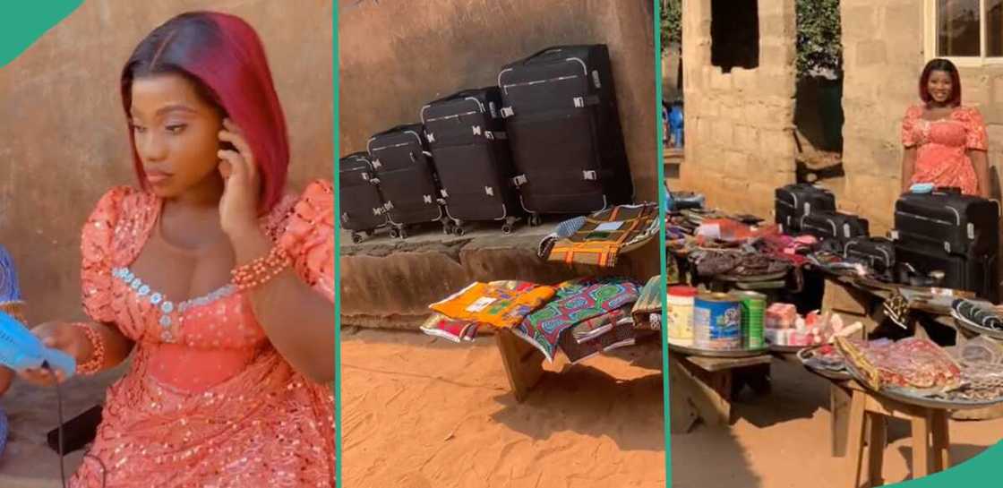 Lady flaunts items presented during her traditional wedding.