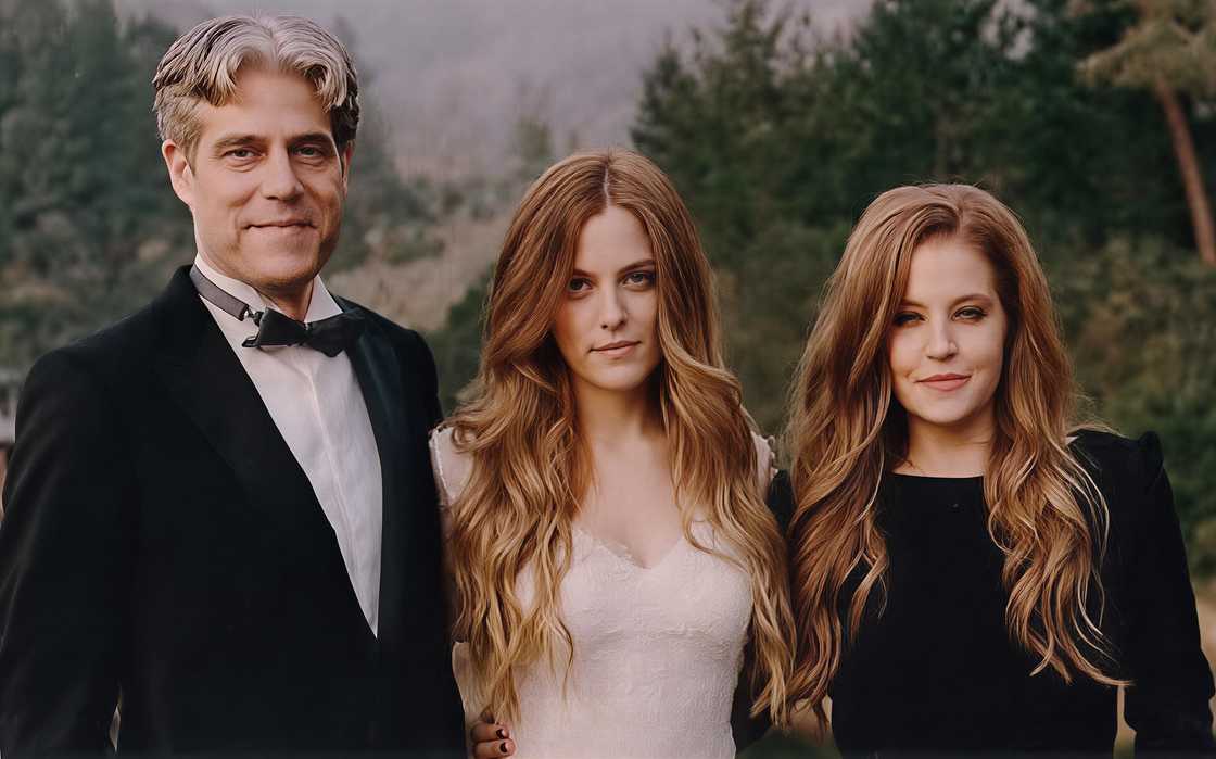 Lisa Marie and Danny Keough pose outdoors during
during their daughter's wedding Lisa Marie and Danny Keough pose outdoors during
during their daughter's wedding