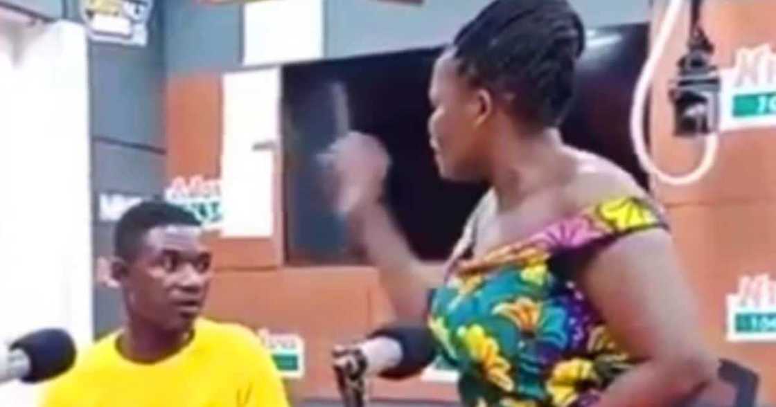 Video shows moment vexed woman slapped her husband on live radio for revealing how she keeps urine and poo in their bedroom Video shows moment vexed woman slapped her husband on live radio for revealing how she keeps urine and poo in their bedroom