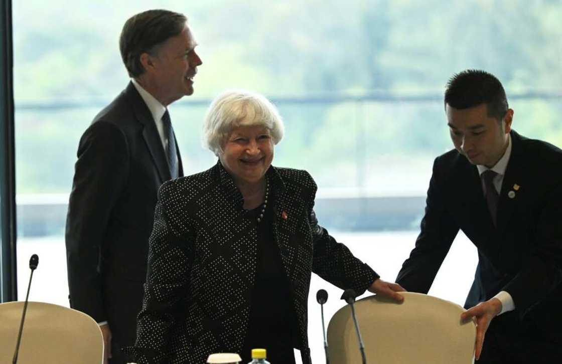 US Treasury chief Janet Yellen (C) and Ambassador to China Nicholas Burns (L) attend a roundtable with business leaders in Guangzhou US Treasury chief Janet Yellen (C) and Ambassador to China Nicholas Burns (L) attend a roundtable with business leaders in Guangzhou