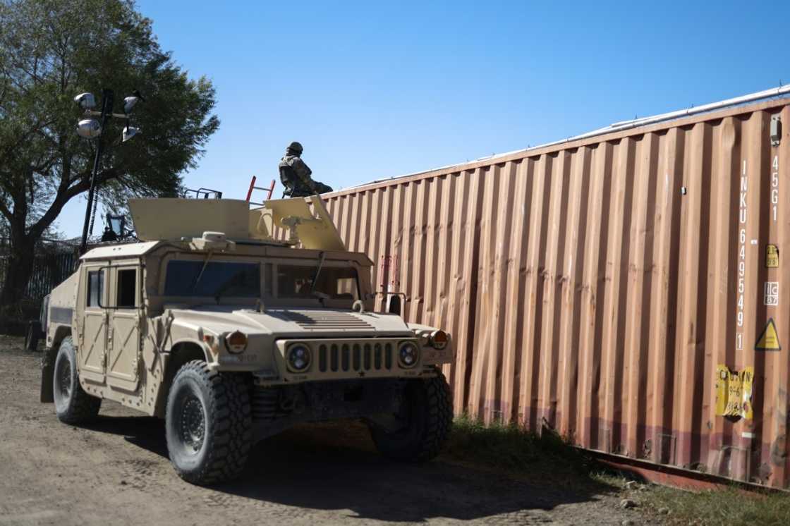 A US Army soldier monitors the country's border with Mexico at Eagle Pass, Texas, after President Donald Trump ordered 1,500 more active military personnel to the border as part of his actions to tackle undocumented immigration