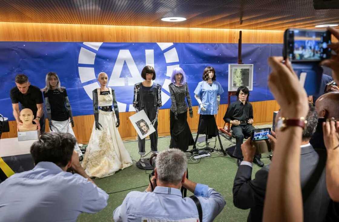 The event in Geneva was presented as the world's first press conference with a panel of AI-enabled humanoid social robots The event in Geneva was presented as the world's first press conference with a panel of AI-enabled humanoid social robots