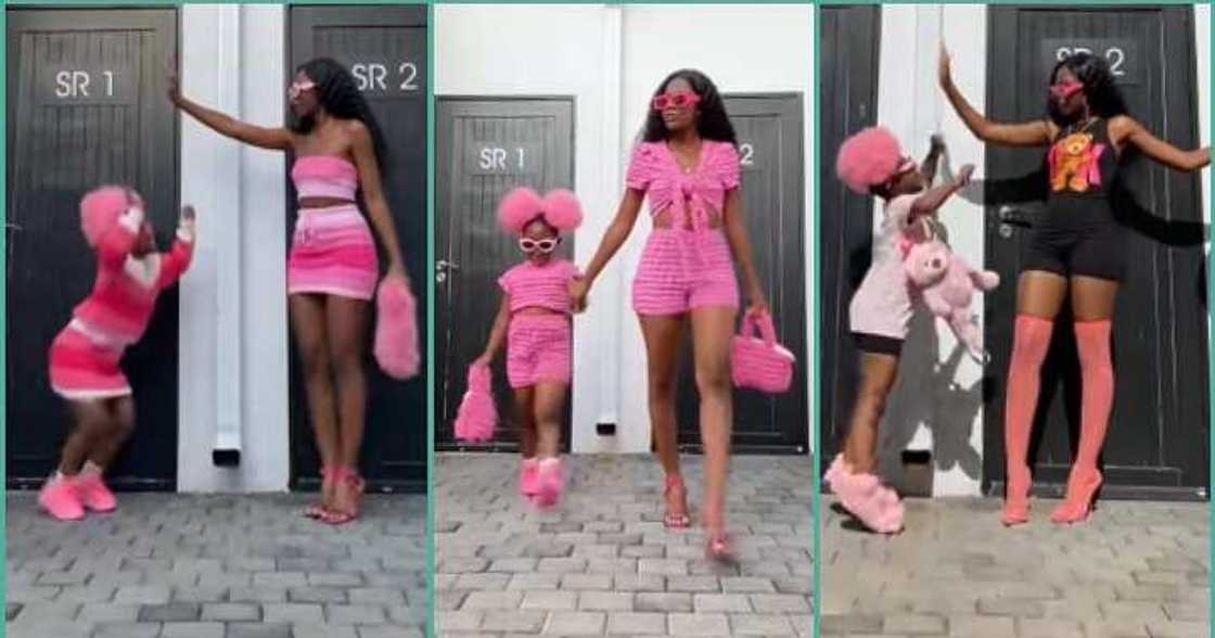 Adorable mother and daughter twin together, rock similar outfits Adorable mother and daughter twin together, rock similar outfits