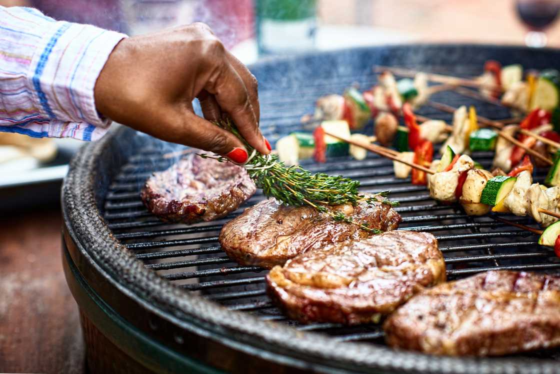 A woman grilling food