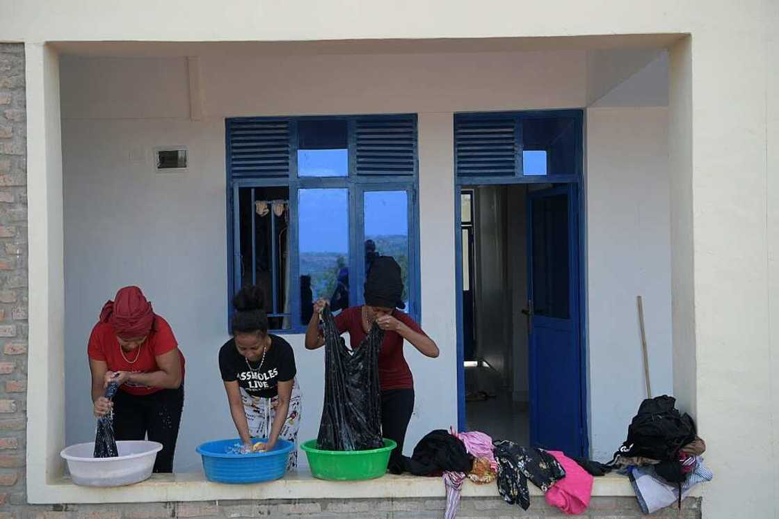 Eritrean asylum seekers wash their clothes at the Gashora camp Eritrean asylum seekers wash their clothes at the Gashora camp