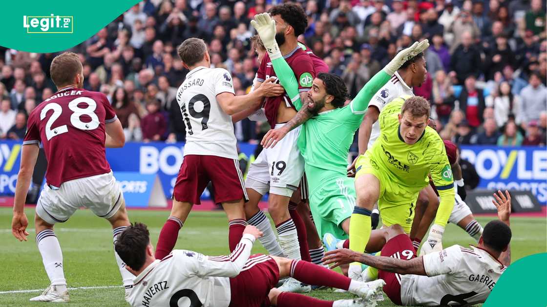 West Ham United fouls David Raya resulting in a late equalising goal for West Ham being disallowed by VAR. Photo by Marc Atkins