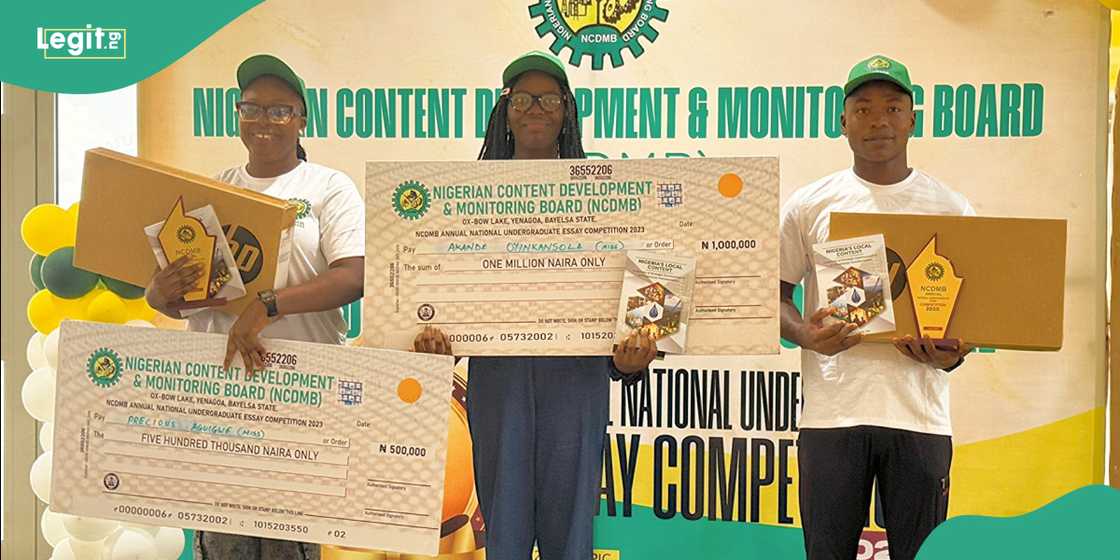 Top three contestants show off their prize checks
