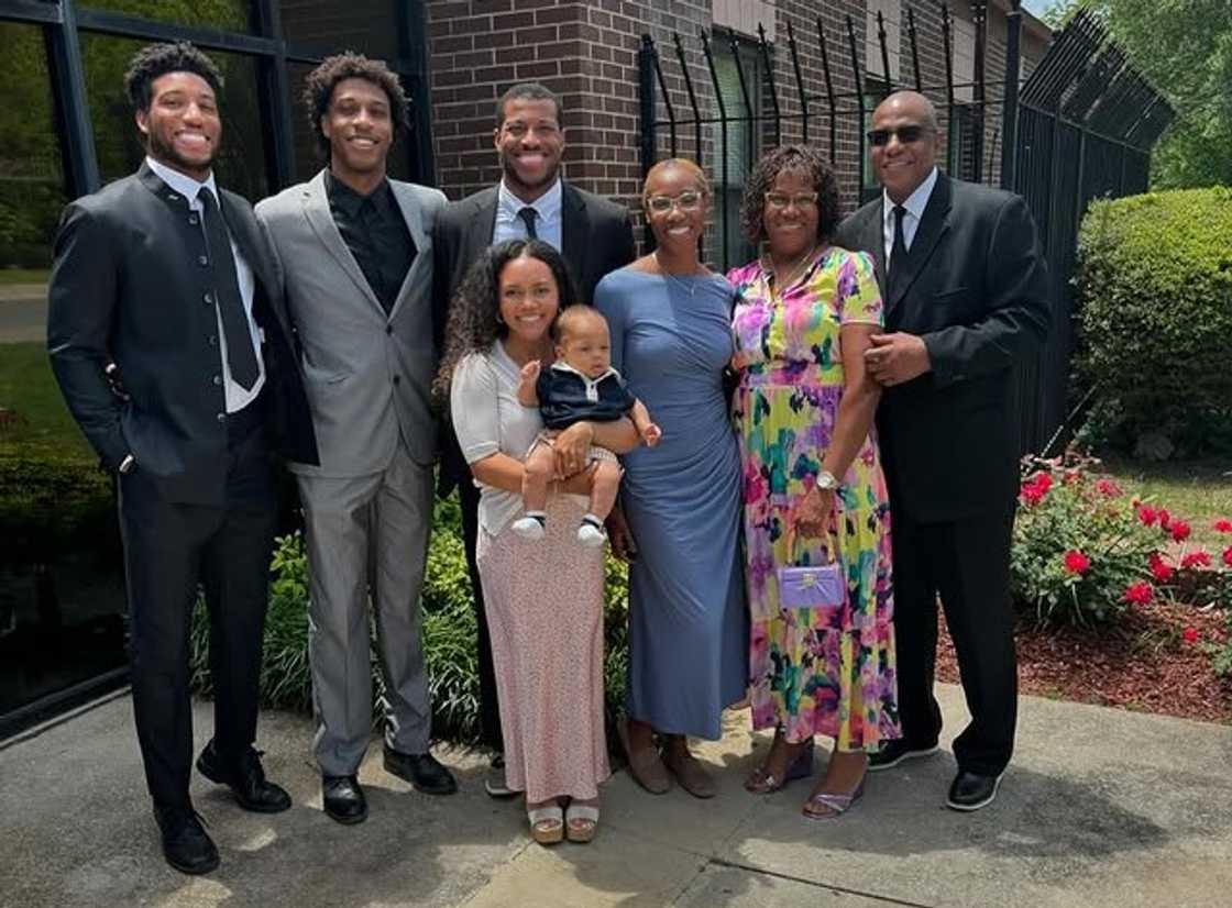 Marlon Humphrey's family members posing for a group photo