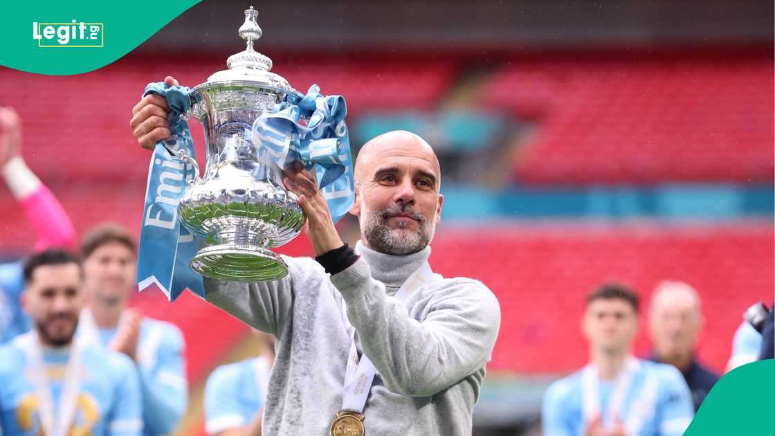 Pep Guardiola, Manager of Manchester City celebrates with the trophy after winning the Emirates FA Cup Final match between Chelsea and Manchester City on May 16, 2026 in London, England. Photo by Ed Sykes