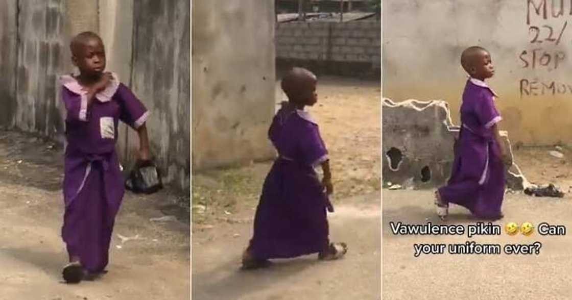 Little girl in oversized uniform, oversize Little girl in oversized uniform, oversize