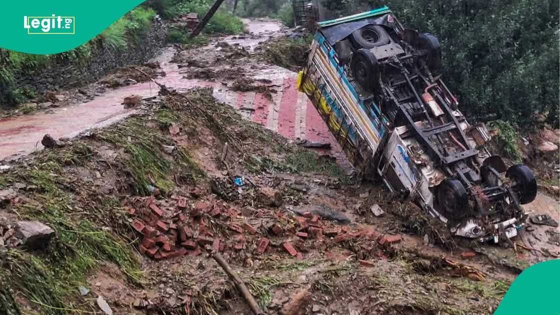 Truck overturned as rain causes havoc in India. Truck overturned as rain causes havoc in India.