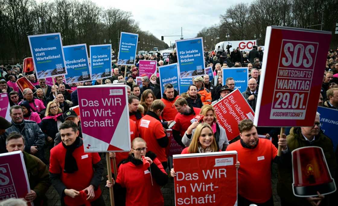 Demonstrators in Berlin during a nationwide 'Economic Warning Day' Demonstrators in Berlin during a nationwide 'Economic Warning Day'