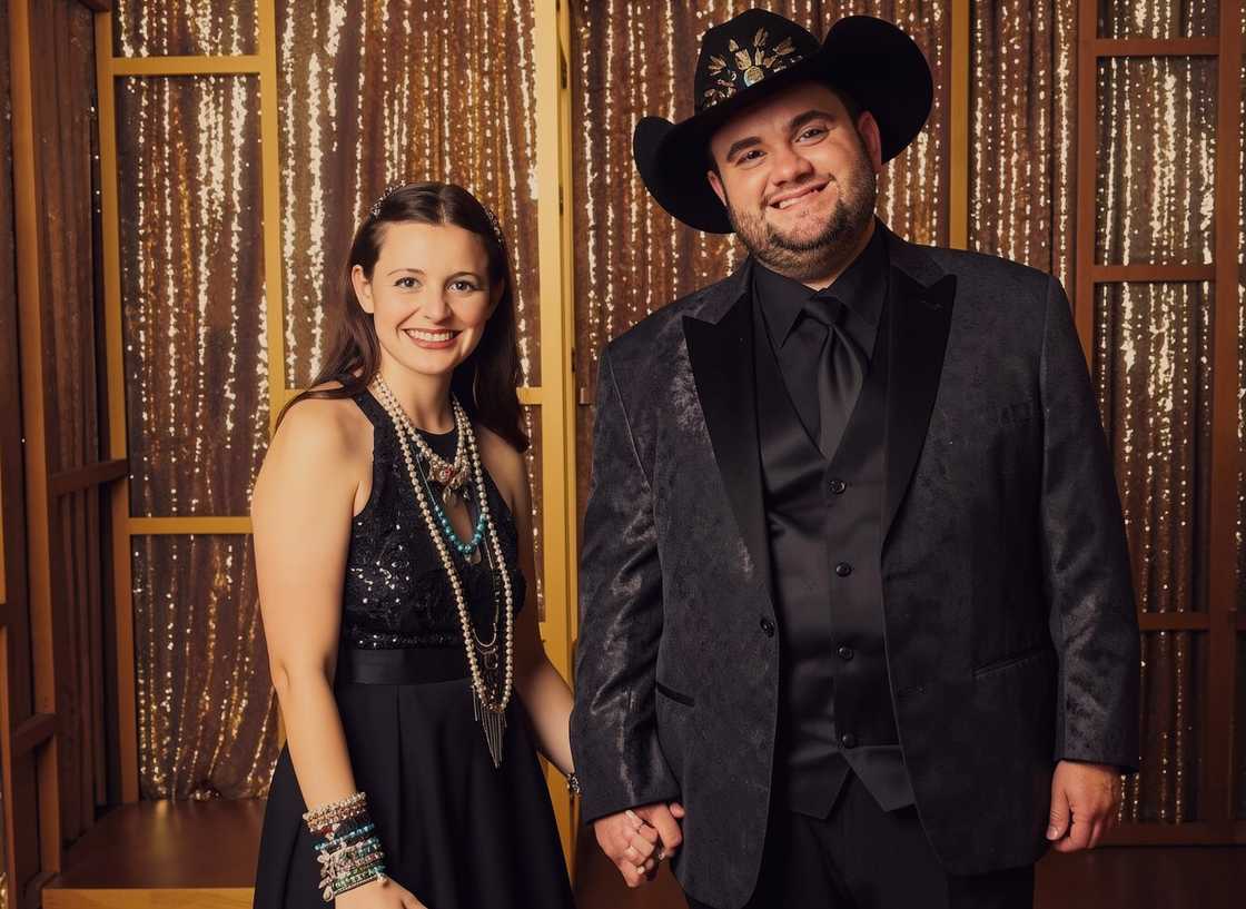 Tyler White and Madison Marilla pose at the CMA Awards