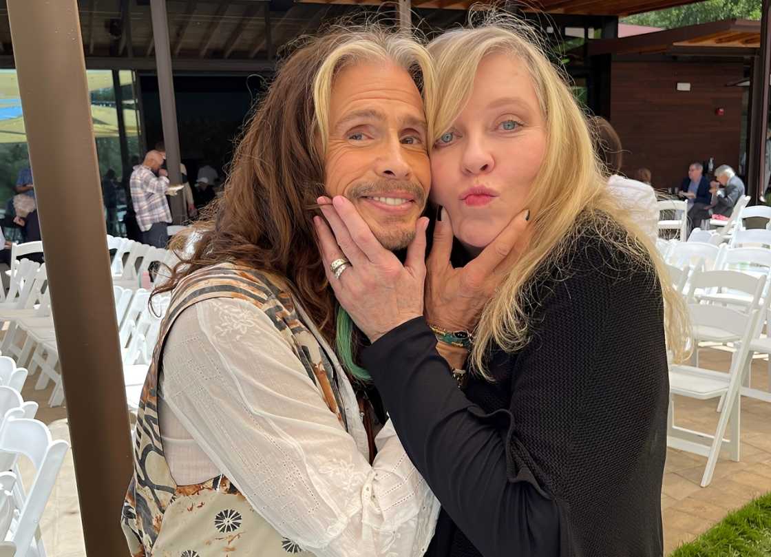 Steven Tyler posing with Bebe Buell. Steven Tyler posing with Bebe Buell.
