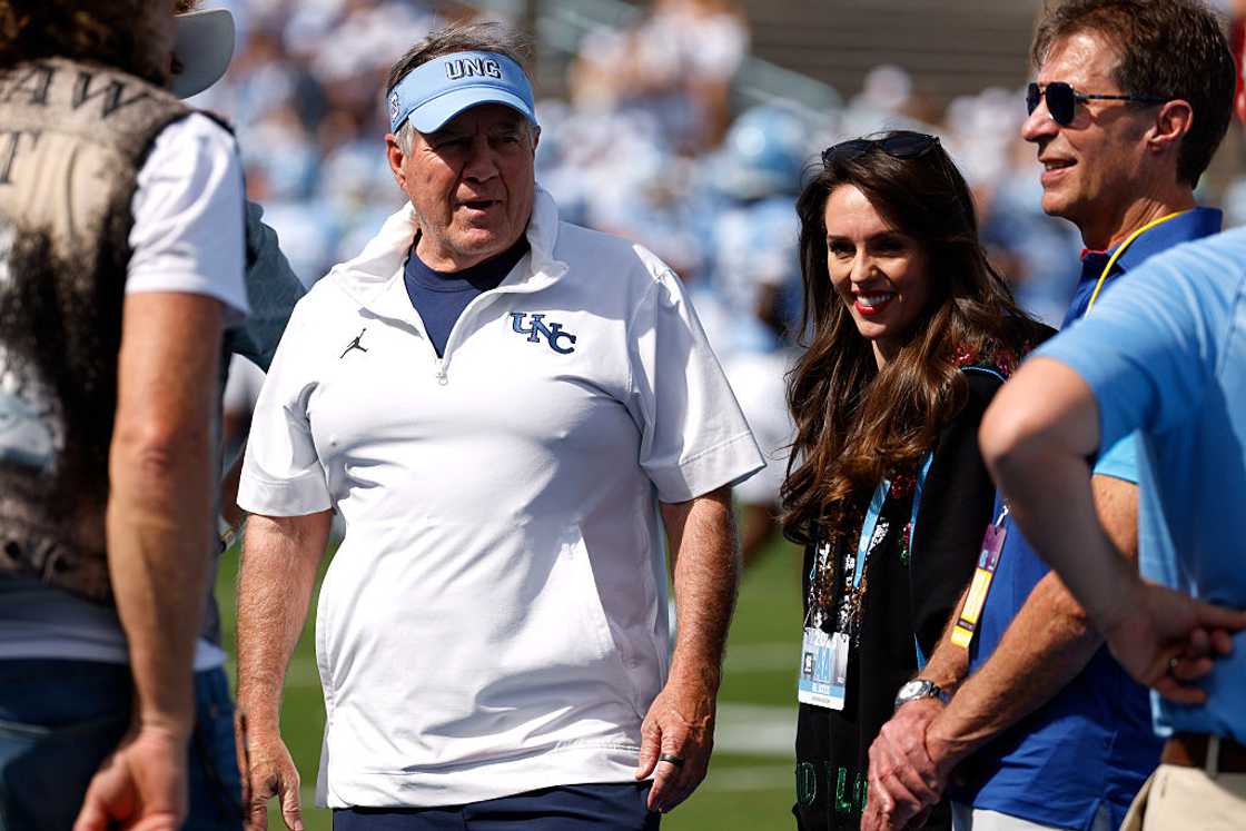 Bill Belichick and Jordon Hudson at Kenan Memorial Stadium Bill Belichick and Jordon Hudson at Kenan Memorial Stadium