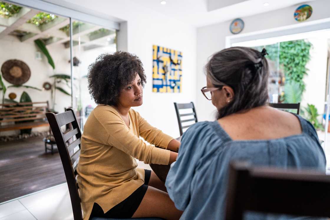 Mother and daughter talking Mother and daughter talking
