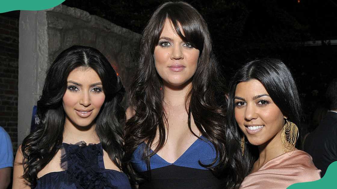 Kim Kardashian, Khloe Kardashian, and Kourtney Kardashian appear at an entertainment event Kim Kardashian, Khloe Kardashian, and Kourtney Kardashian appear at an entertainment event