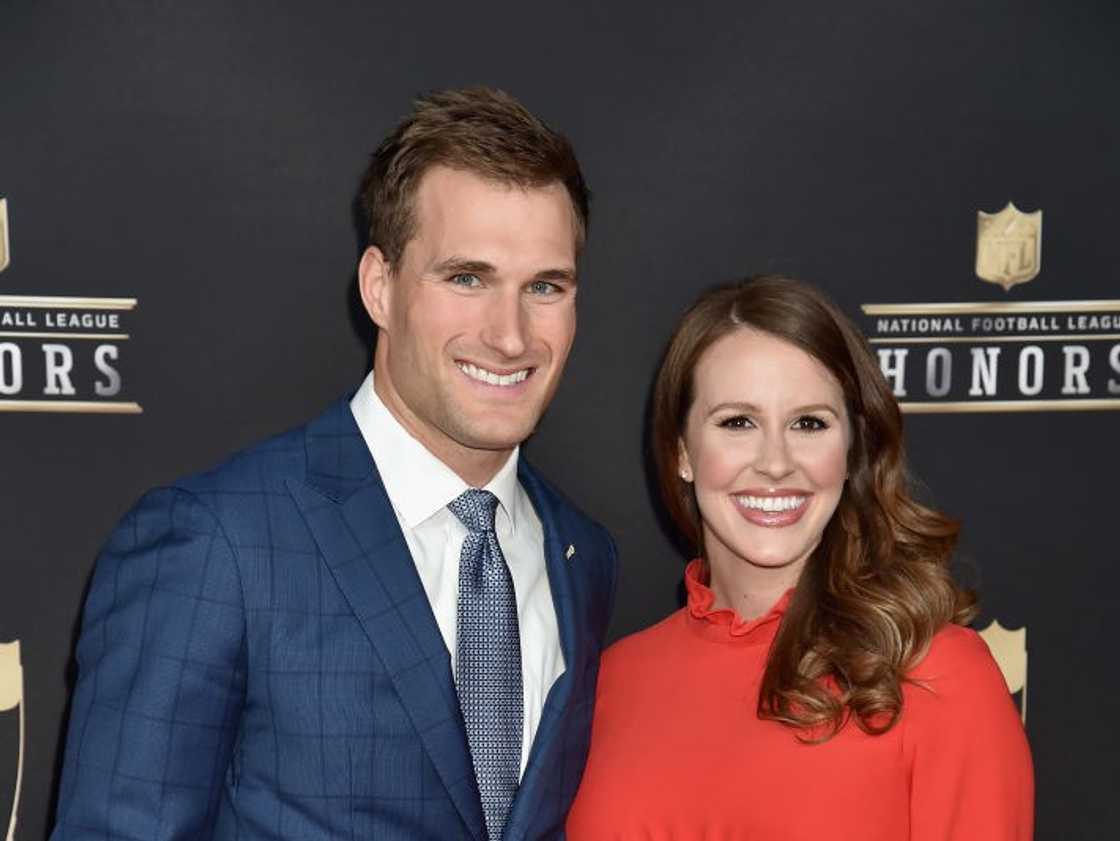 NFL player Kirk Cousins (L ) and Julie Hampton (R) at The Fox Theatre NFL player Kirk Cousins (L ) and Julie Hampton (R) at The Fox Theatre