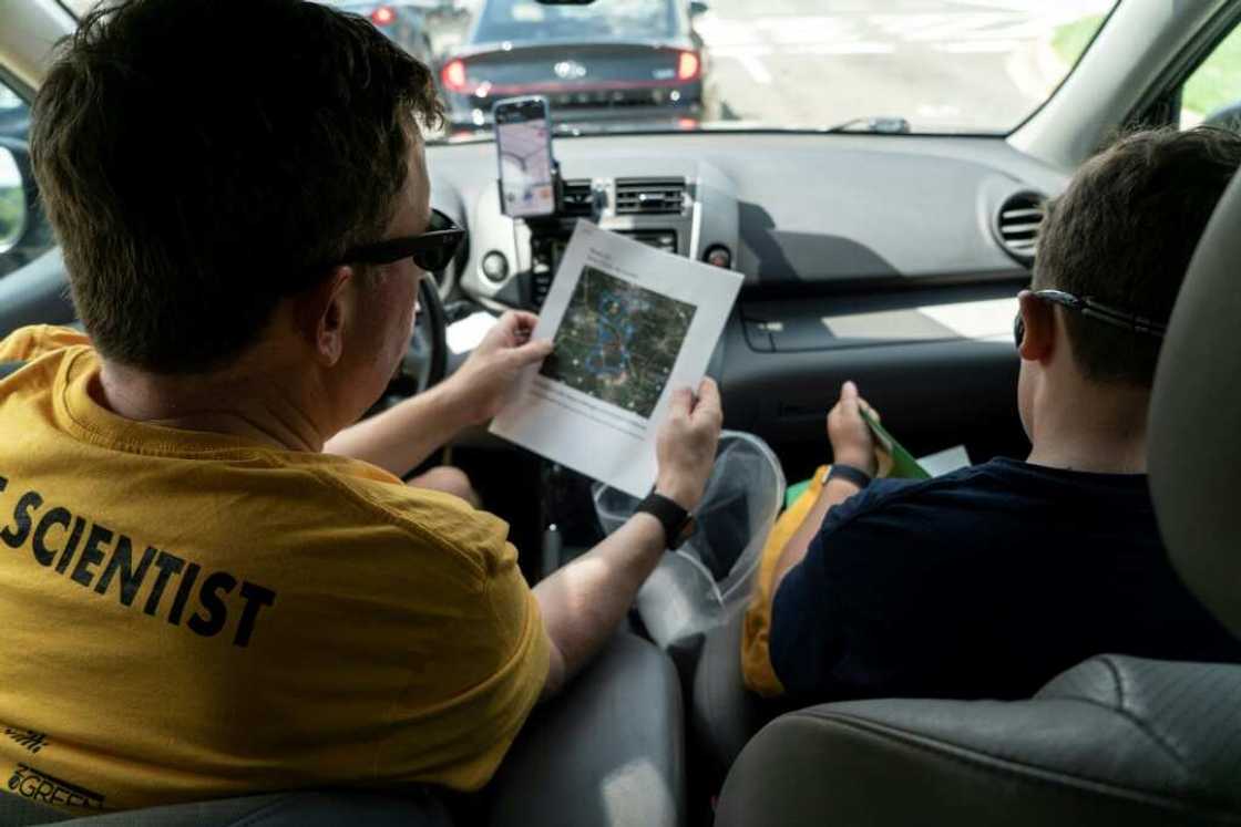 Jonathan Mullinix and his 10-year-old son take part in an urban heat mapping project