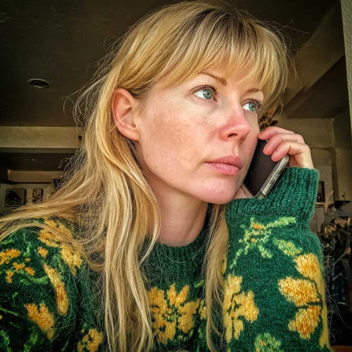 A woman wearing a green jersey A woman wearing a green jersey