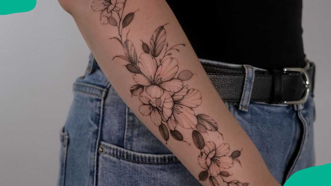 Arm cherry blossom tattoo