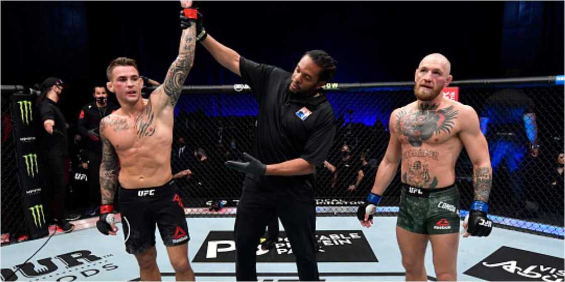 Dustin Poirier stuns Conor McGregor in UFC 257 lightweight bout Dustin Poirier stuns Conor McGregor in UFC 257 lightweight bout