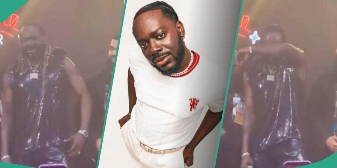 Adekunle Gold crying on stage. Adekunle Gold crying on stage.