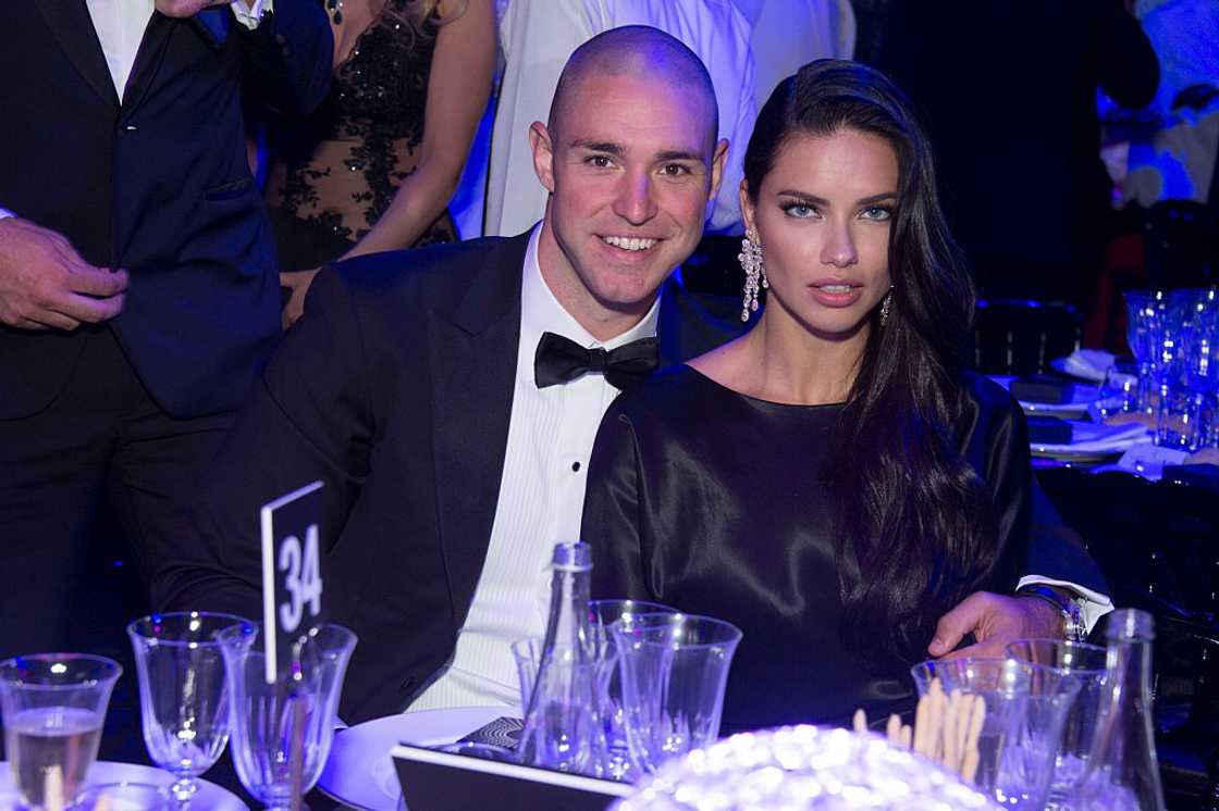 Adriana Lima (R) and Joe Thomas attend an event together at Hotel du Cap-Eden-Roc