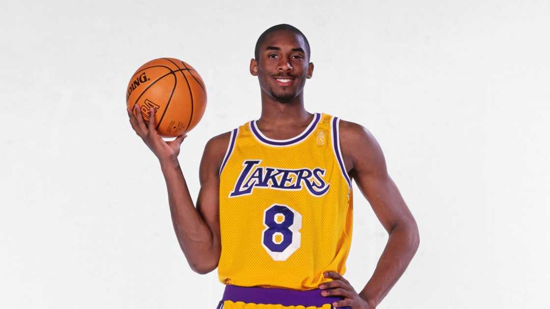 Kobe Bryant of the Los Angeles Lakers smiles during a photoshoot. Kobe Bryant of the Los Angeles Lakers smiles during a photoshoot.