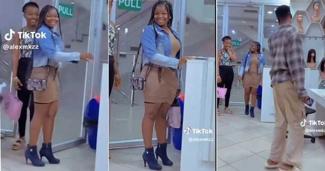 Lady with fine shape wears fitted short gown to work Lady with fine shape wears fitted short gown to work