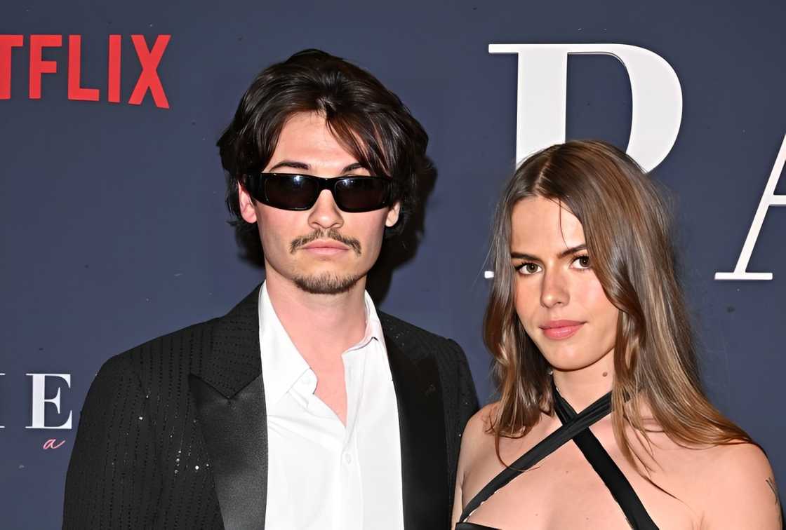 Dylan Jagger Lee and Paula Bruss are photographed at the Premiere of Netflix's "Pamela, a Love Story"
